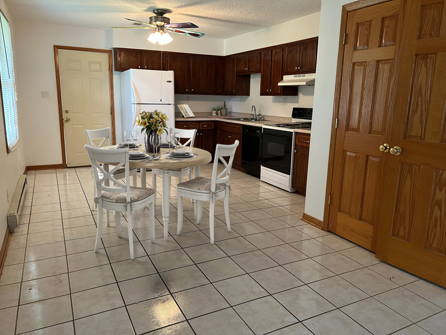 532 West Street, Unit 1 Lockport, IL 60441 - Photo 4 of 16 a view of kitchen with furniture wooden floor and window