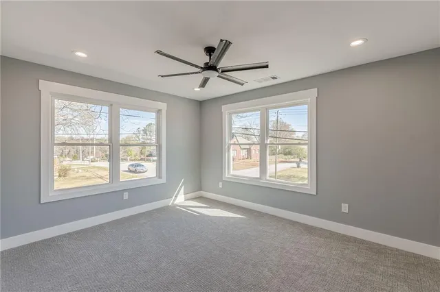 an empty room with windows