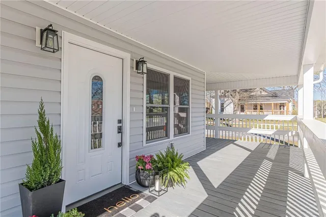 a view of entryway with wooden floor