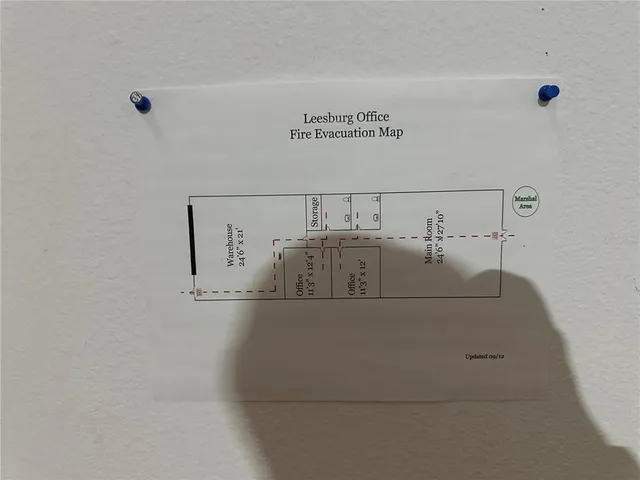 a view of car parked in front of house