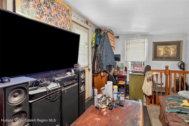 a view of a balcony with wooden floor