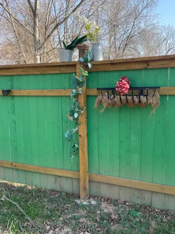 a front view of a house with a big yard