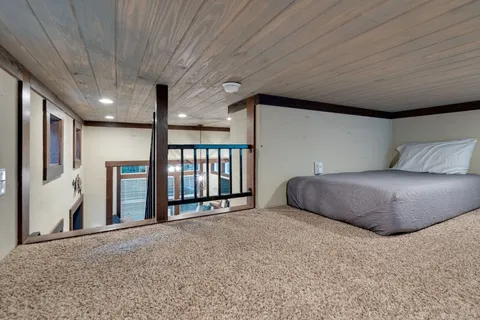 a view of a patio with a table chairs and a patio