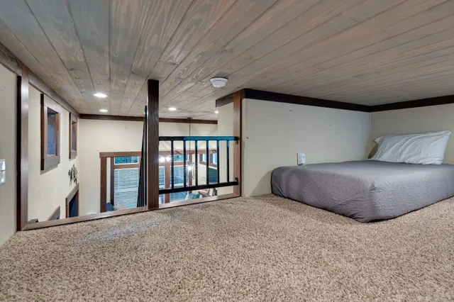 a view of a patio with a table chairs and a patio