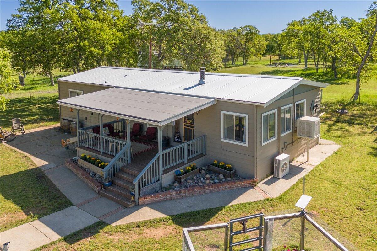 16455 Ridge Road Red Bluff, CA 96080 - Photo 1 of 56 an aerial view of a house with swimming pool and next to a yard