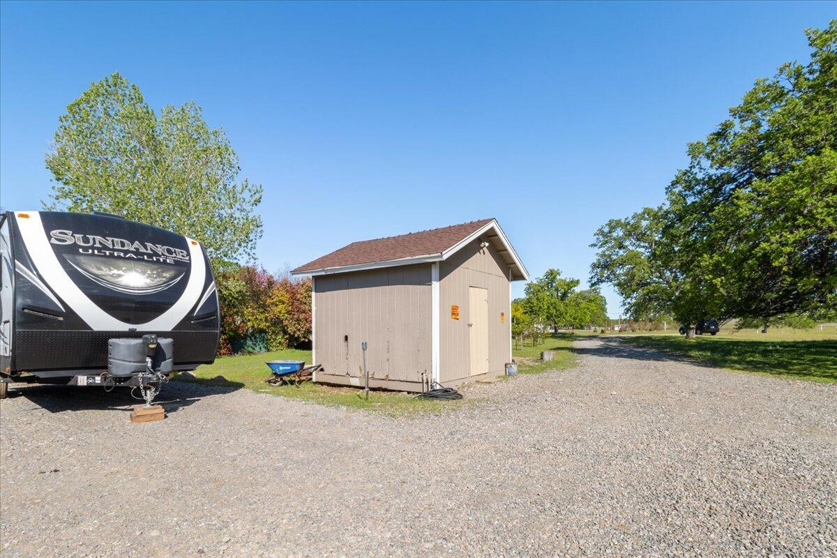 16455 Ridge Road Red Bluff, CA 96080 - Photo 34 of 56 a view of a house with a yard