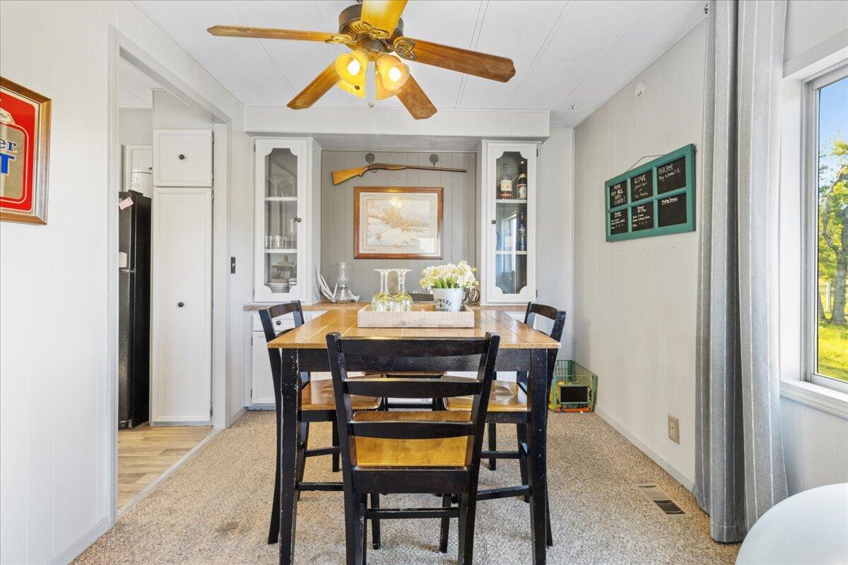 16455 Ridge Road Red Bluff, CA 96080 - Photo 8 of 56 a dining room with furniture and window
