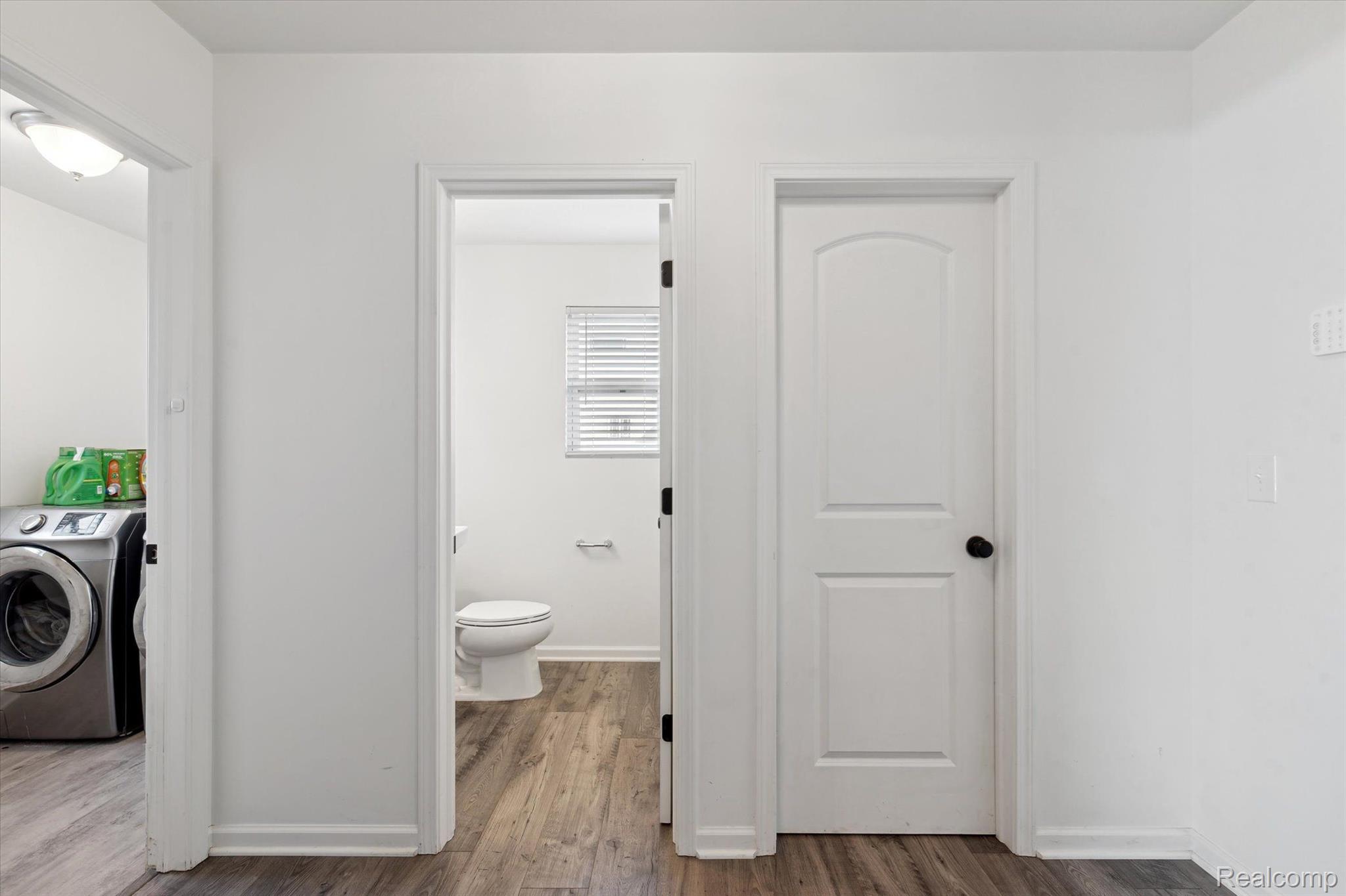 8024 Jordan Drive Jackson, MI 49201 - Photo 20 of 39 Back Hall Powder Room & Closet