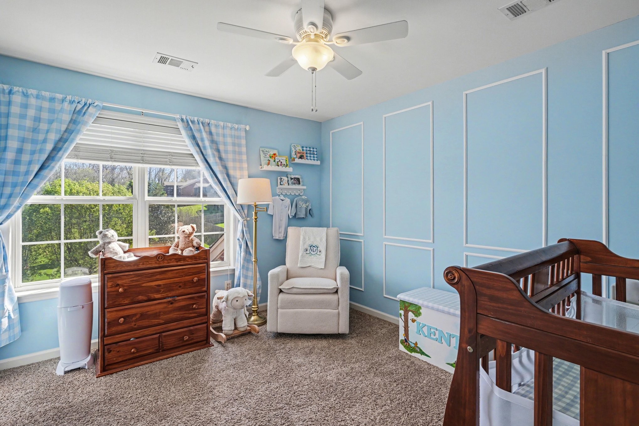 344 Landings Way Mount Juliet, TN 37122 - Photo 14 of 26 a bedroom with a bed and a chandelier