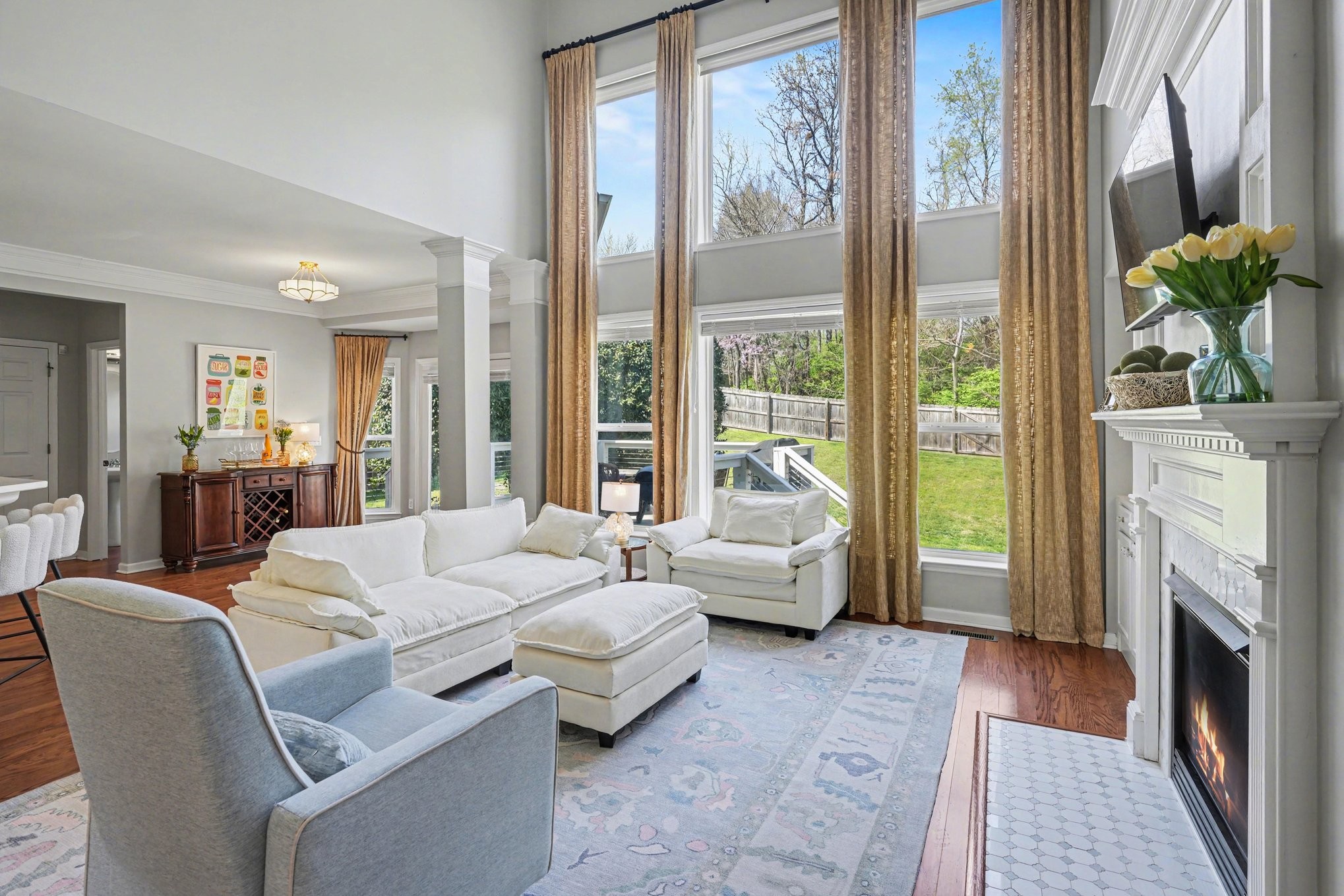 344 Landings Way Mount Juliet, TN 37122 - Photo 5 of 26 a living room with furniture large window and a fireplace