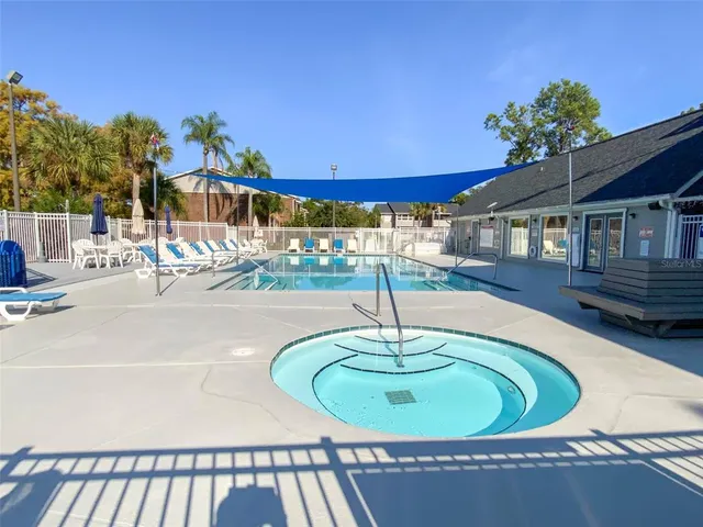 a roof deck view with a potted plants