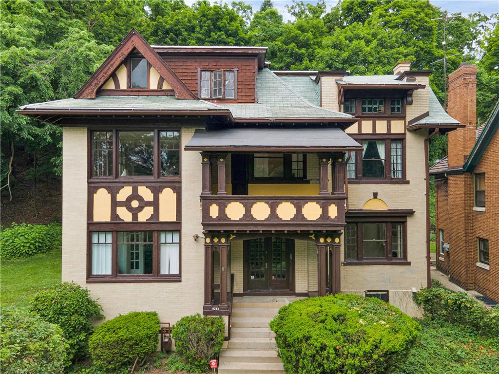 4283 Andover Terrace Pittsburgh, PA 15213 - Photo 1 of 25 front view of a house with a small yard