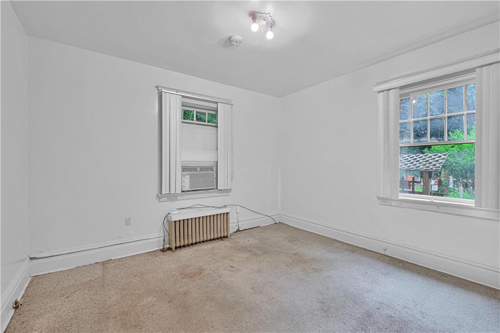 4283 Andover Terrace Pittsburgh, PA 15213 - Photo 11 of 25 an empty room with windows and closet