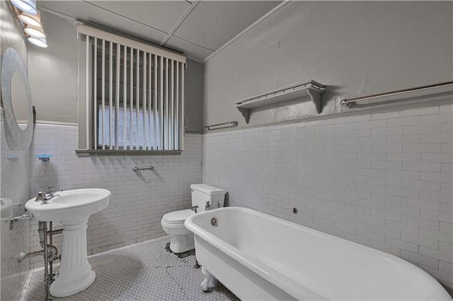 a bathroom with a sink and a bathtub