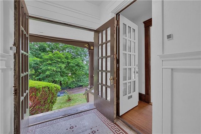 a view of a porch with a garden