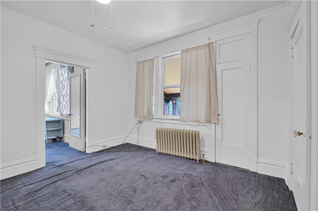4283 Andover Terrace Pittsburgh, PA 15213 - Photo 21 of 25 an empty room with windows