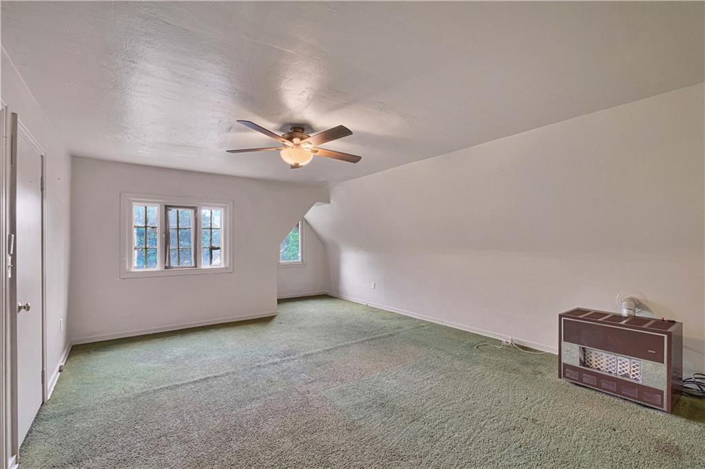 4283 Andover Terrace Pittsburgh, PA 15213 - Photo 23 of 25 a view of an empty room with windows