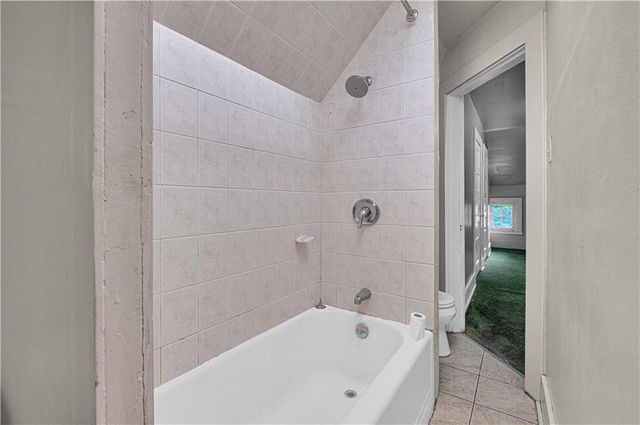a bathroom with a bathtub