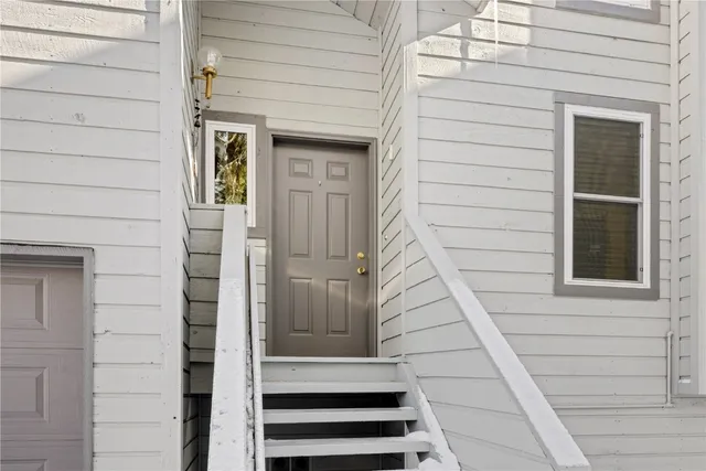 a view of a house with a sink and yard