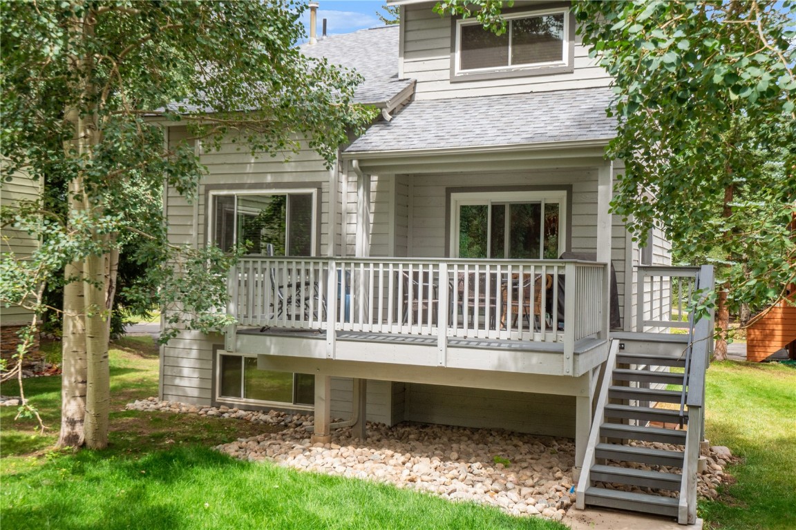 723 Hunters Circle Frisco, CO 80443 - Photo 25 of 32 a front view of a house with a yard