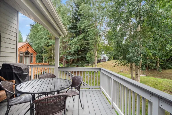 a view of a patio on wooden deck