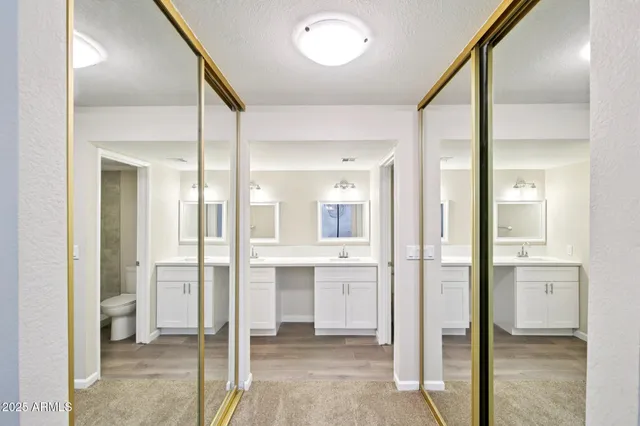 a bathroom with a shower and a sink