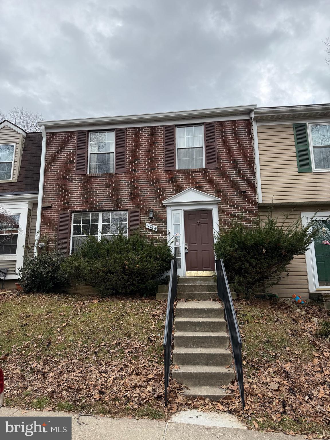11704 Lone Tree Court Columbia, MD 21044 - Photo 1 of 38 a front view of house with yard