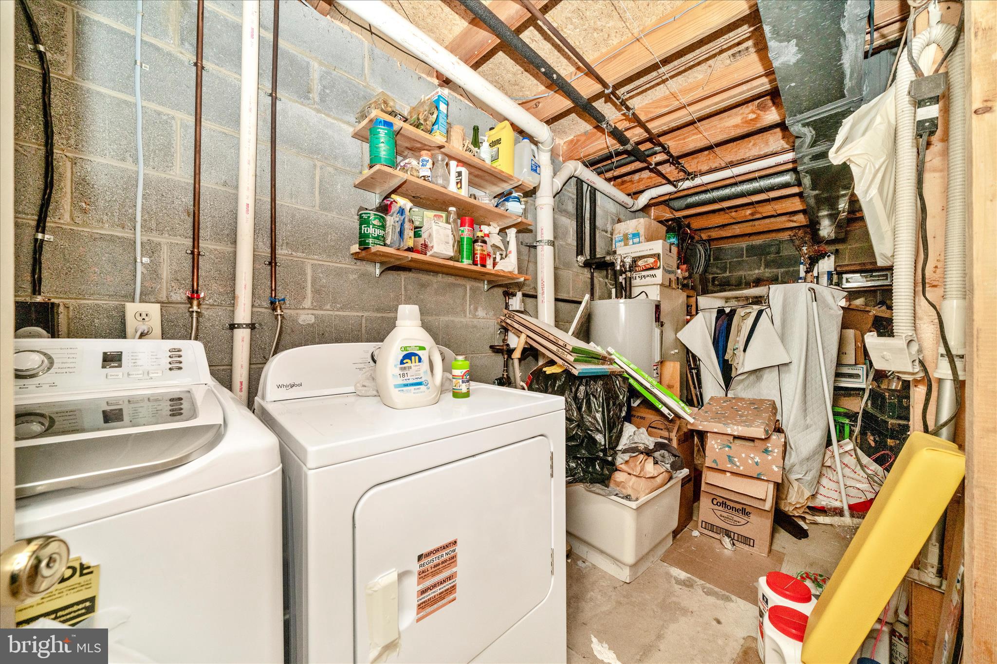 11704 Lone Tree Court Columbia, MD 21044 - Photo 17 of 38 a utility room with dryer and washer
