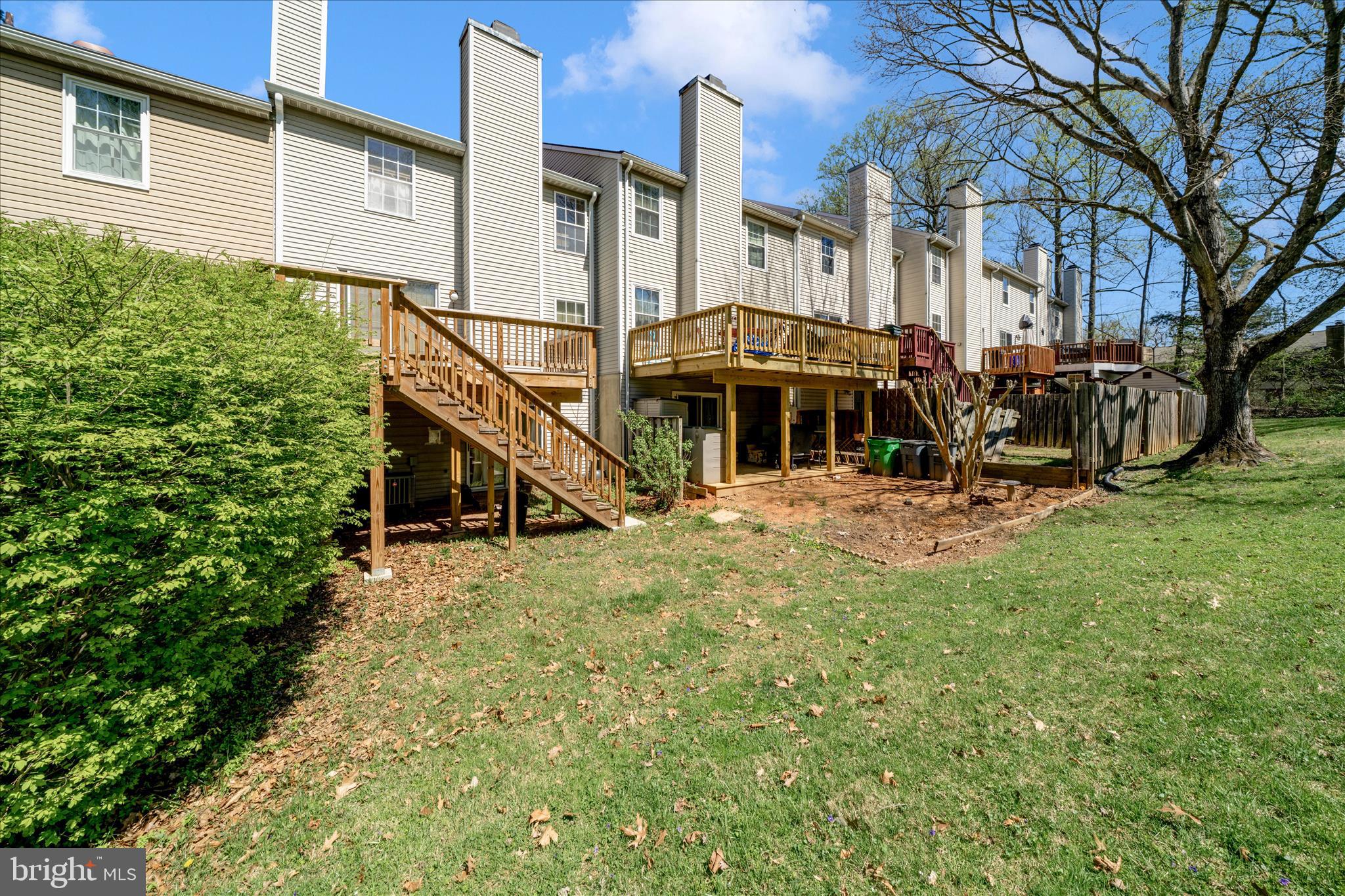 11704 Lone Tree Court Columbia, MD 21044 - Photo 25 of 38 a view of a building with a yard