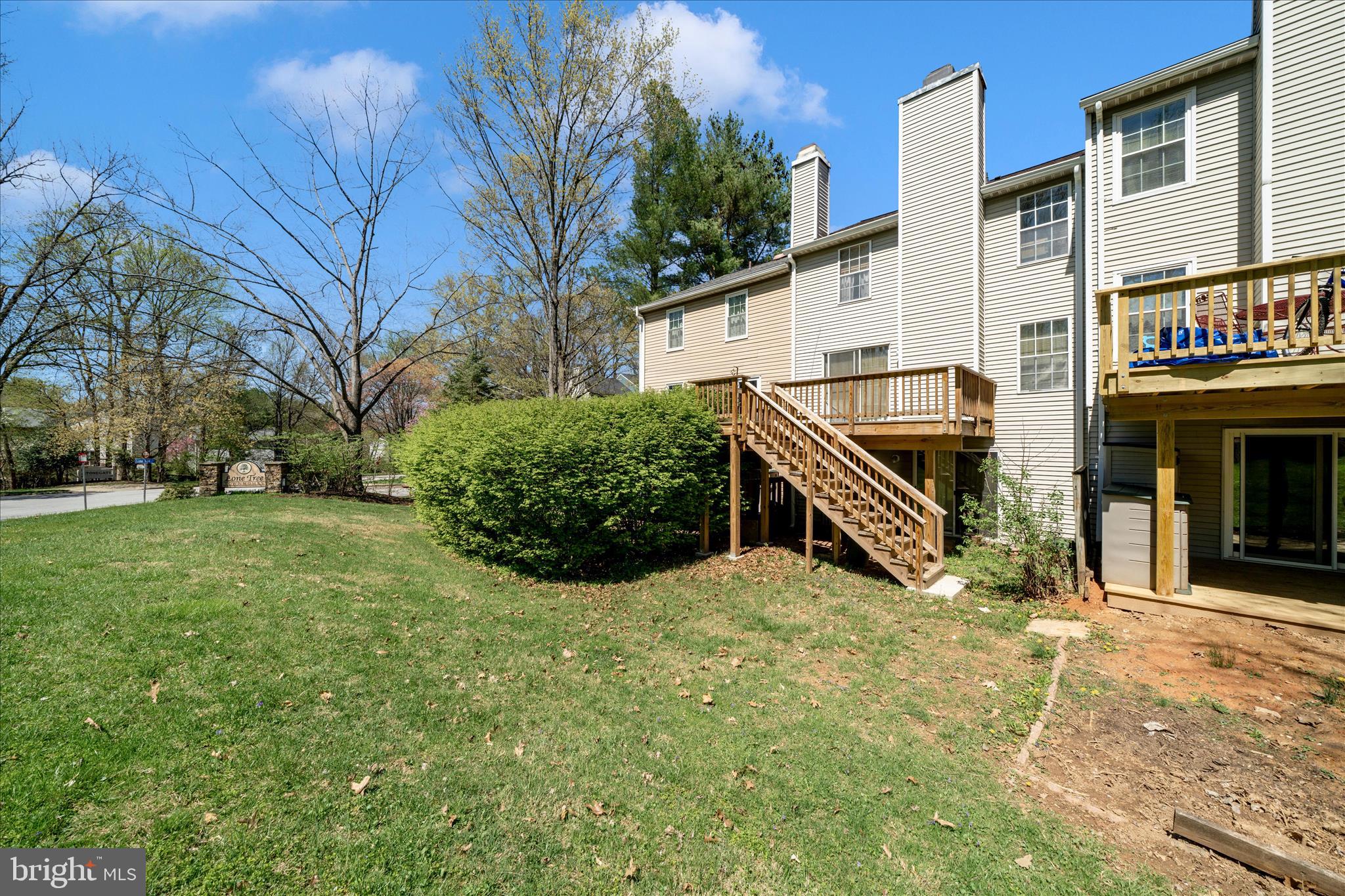 11704 Lone Tree Court Columbia, MD 21044 - Photo 27 of 38 a view of a house with a yard
