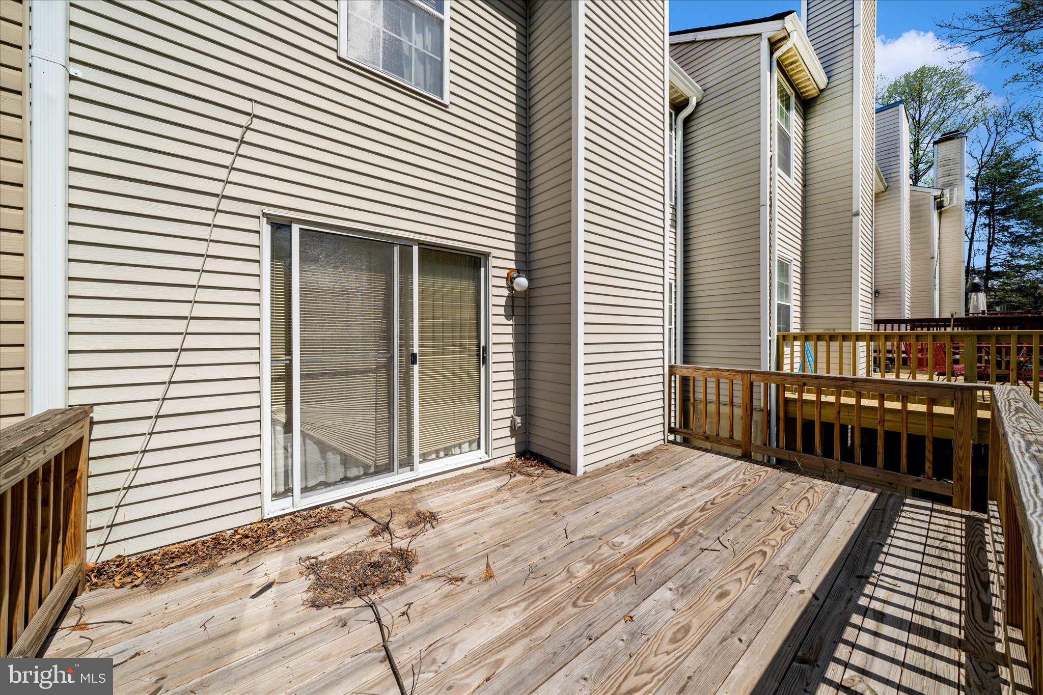 11704 Lone Tree Court Columbia, MD 21044 - Photo 31 of 38 a view of a balcony with wooden floor