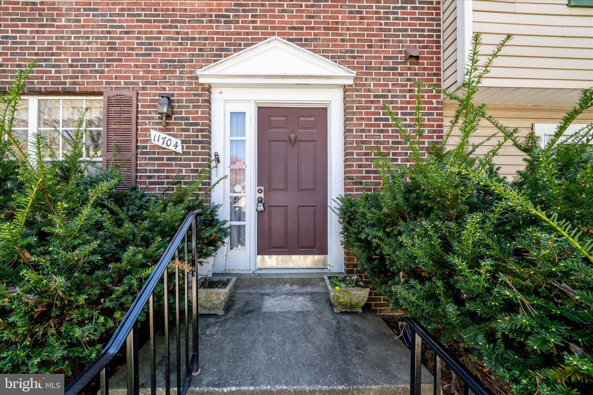 11704 Lone Tree Court Columbia, MD 21044 - Photo 4 of 38 a view of entryway with a yard