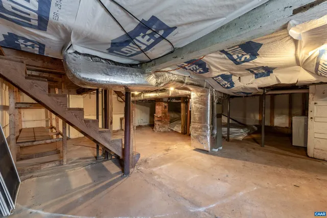 a view of a storage & utility room with a sink