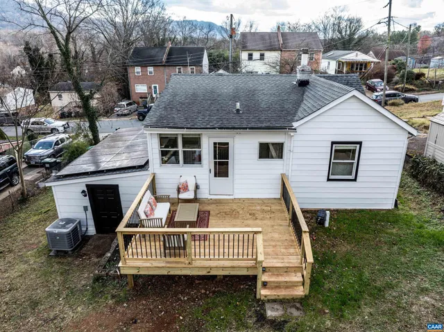 a view of swimming pool with seating space