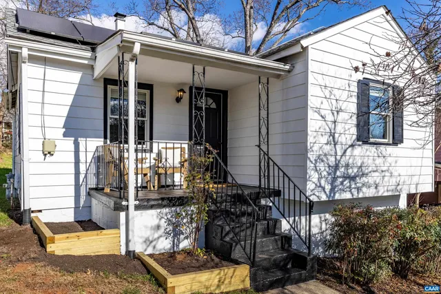 a view of a livingroom with furniture and windows