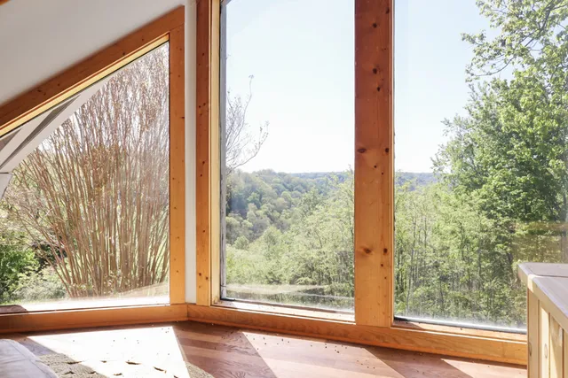 a view of a room that has a window