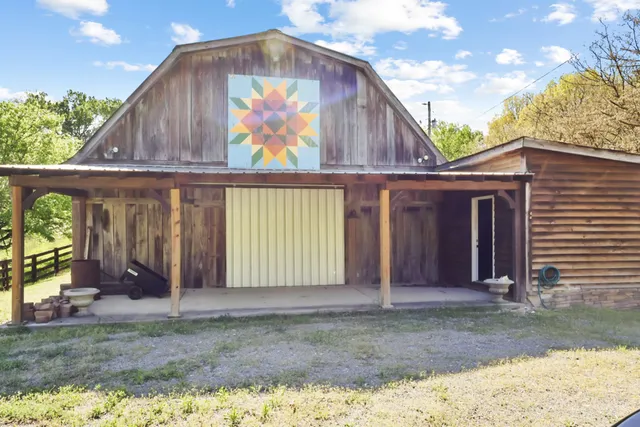 a view of house with outdoor space