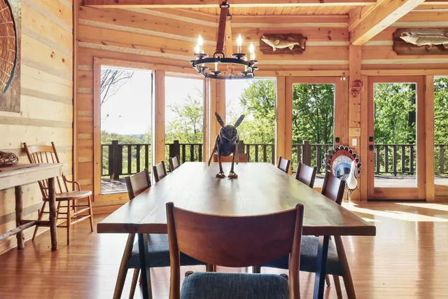 a dining room with furniture window wooden floor