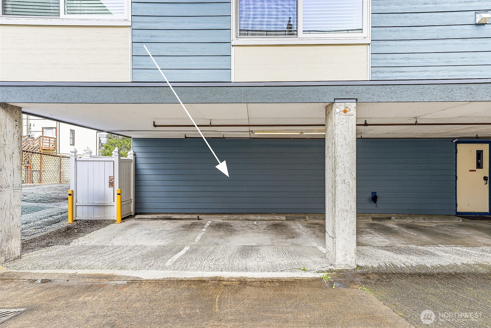 3045 20th Avenue West, Unit 409 Seattle, WA 98199 - Photo 20 of 25 a view of backyard of house