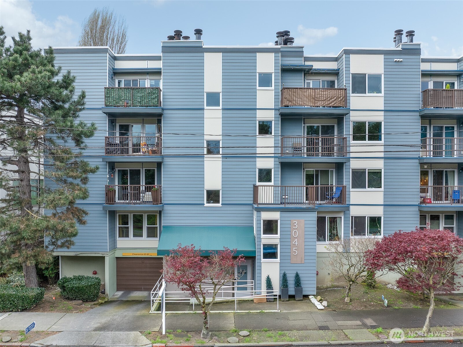3045 20th Avenue West, Unit 409 Seattle, WA 98199 - Photo 25 of 25 a front view of a multi story building