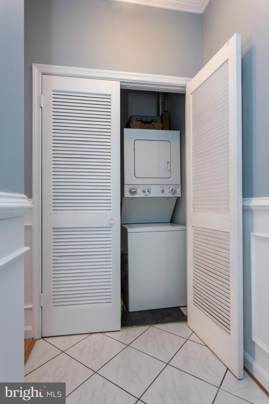 1918 18th Street Northwest, Unit 41 Washington, DC 20009 - Photo 25 of 30 a utility room with washer and dryer