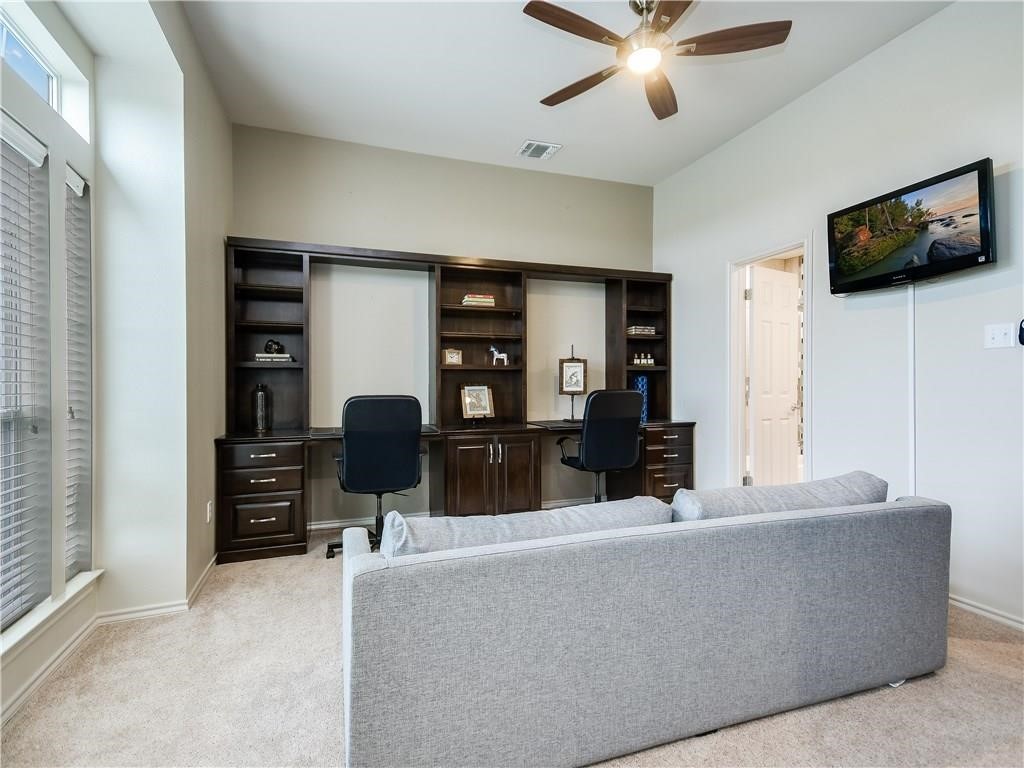 2918 Ranch Road 620 North, Unit W221 Austin, TX 78734 - Photo 11 of 20 a living room with furniture and a flat screen tv