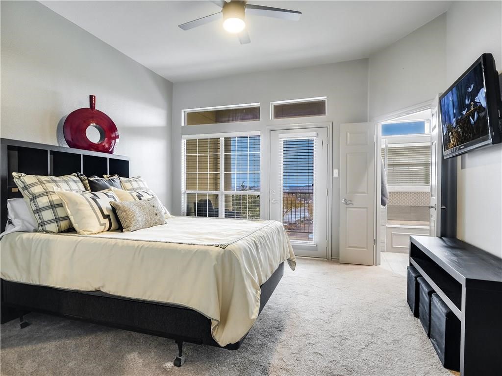 2918 Ranch Road 620 North, Unit W221 Austin, TX 78734 - Photo 9 of 20 a bedroom with a bed and a window