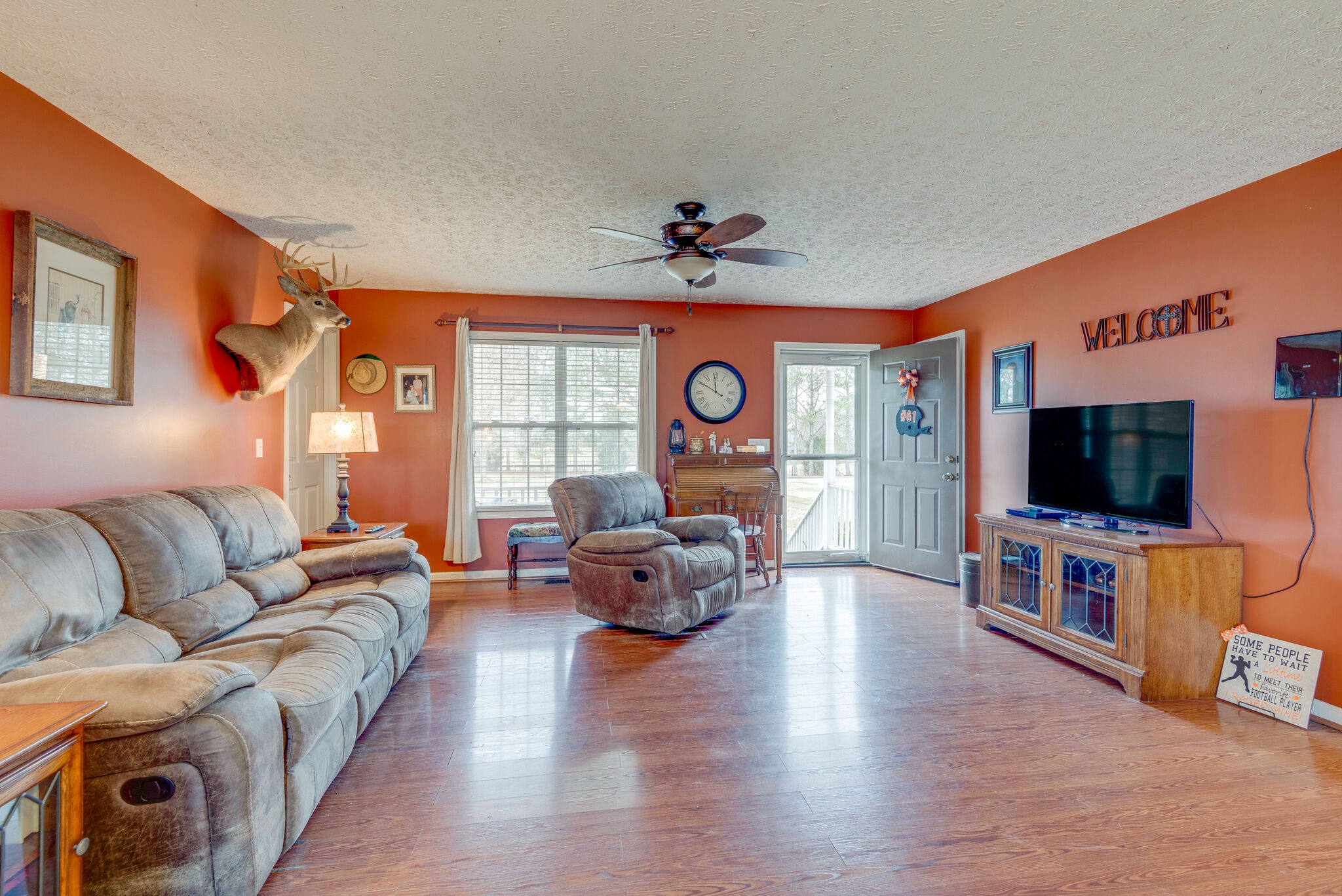 4329 Matthews Road Cedar Hill, TN 37032 - Photo 13 of 17 a living room with furniture and a flat screen tv