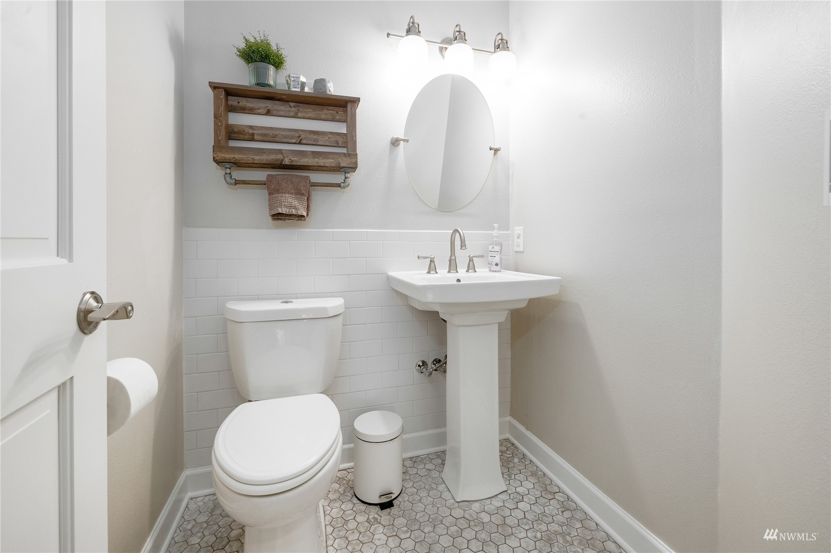 9419 Northeast 175th Street Bothell, WA 98011 - Photo 14 of 28 a bathroom with a sink a toilet and shower