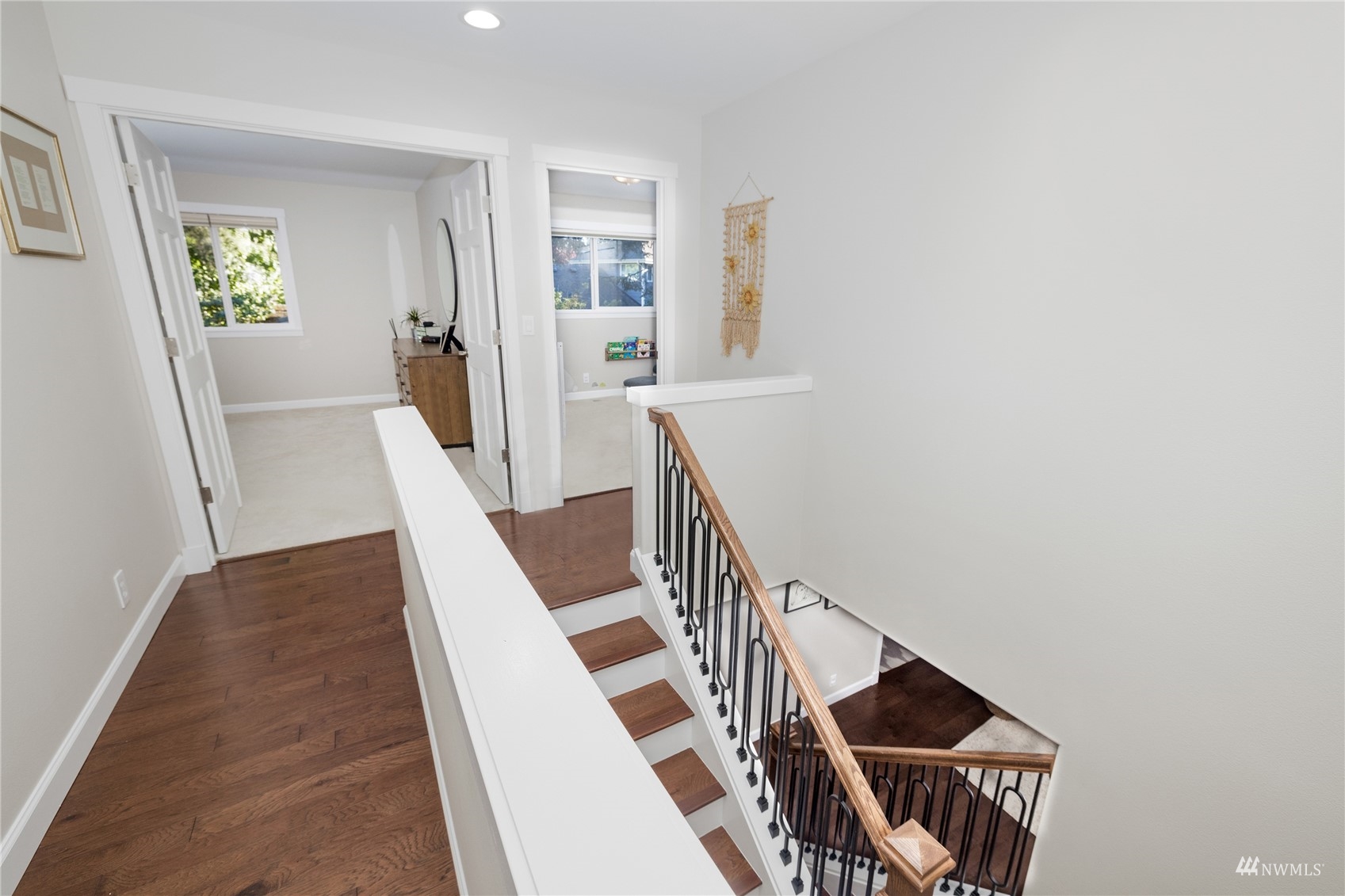 9419 Northeast 175th Street Bothell, WA 98011 - Photo 15 of 28 a view of a livingroom with wooden floor and stairs