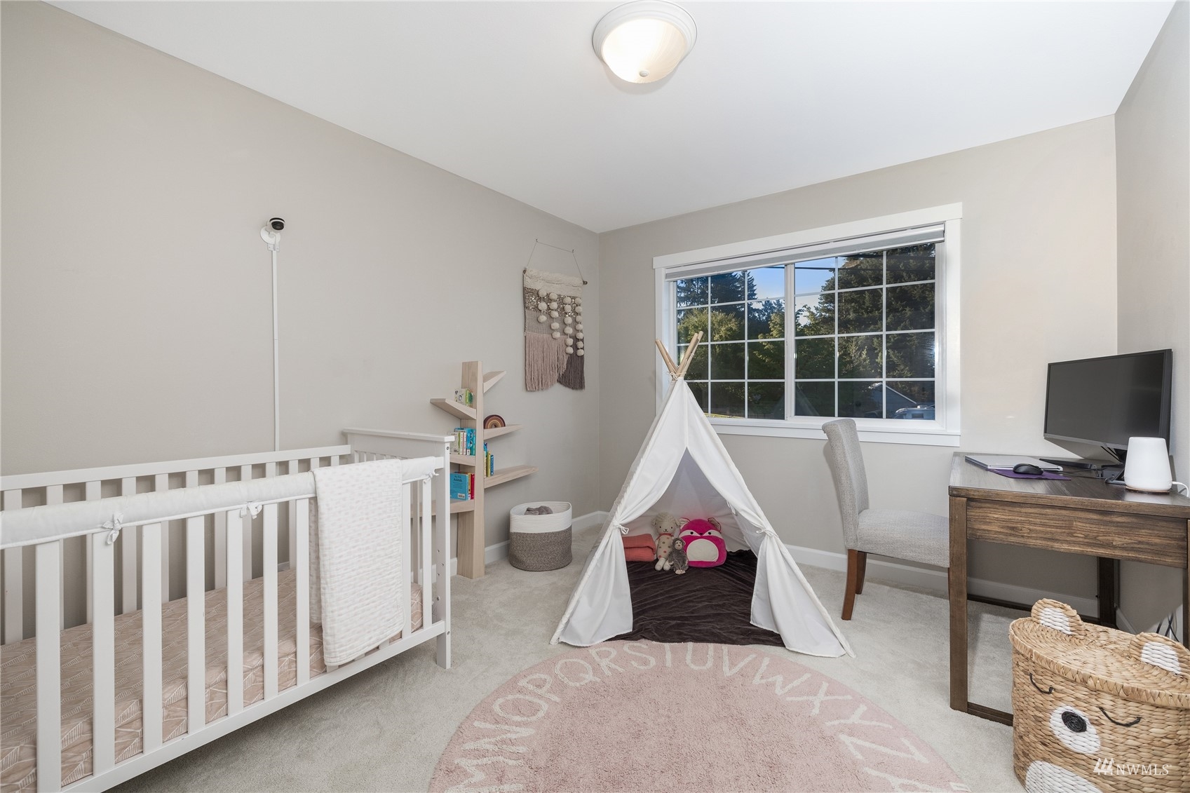 9419 Northeast 175th Street Bothell, WA 98011 - Photo 19 of 28 a view of a workspace with furniture and a window