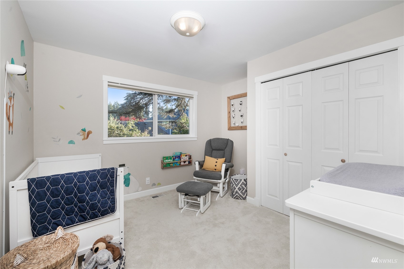 9419 Northeast 175th Street Bothell, WA 98011 - Photo 20 of 28 a living room with furniture and a large window