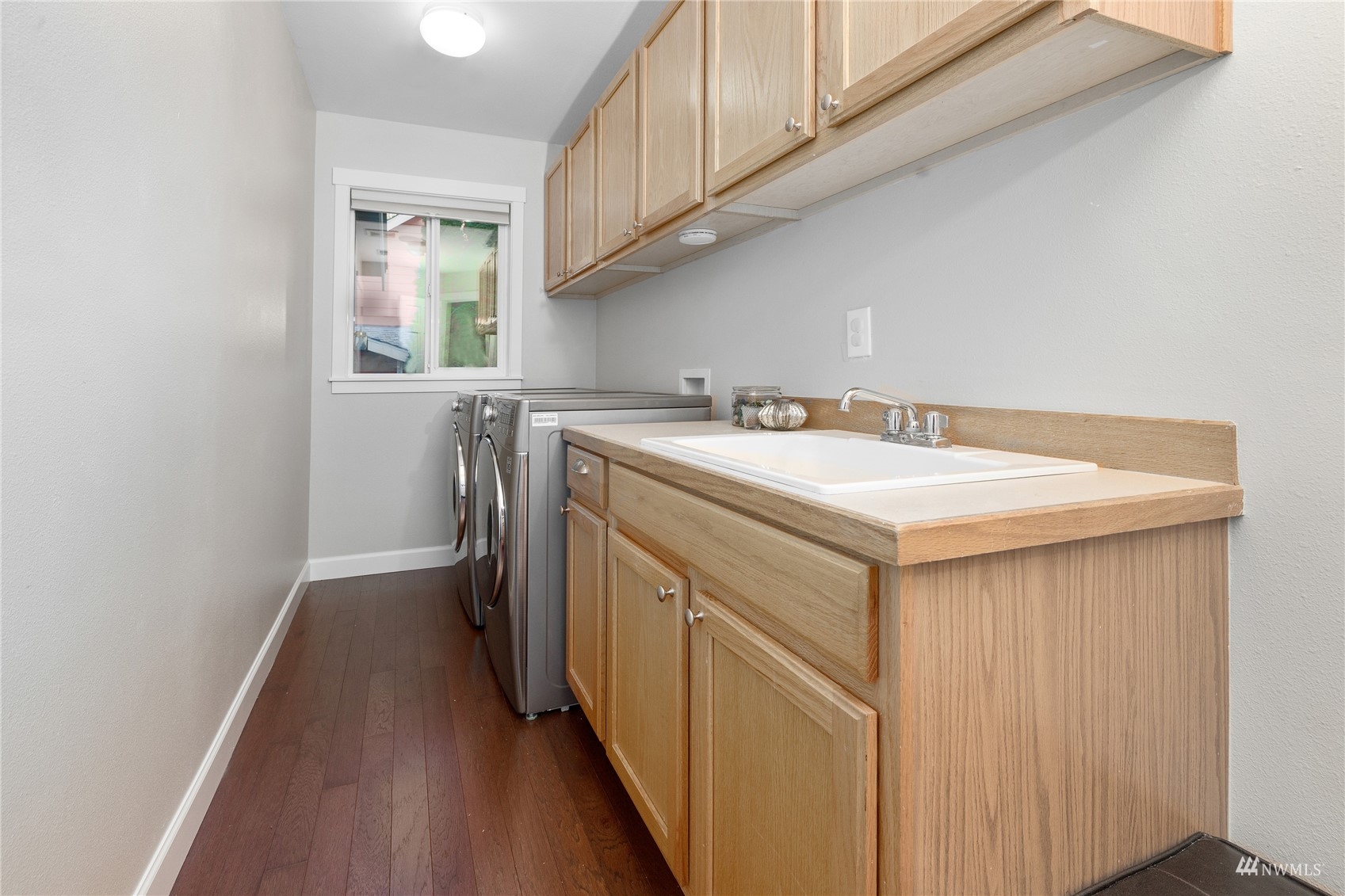 9419 Northeast 175th Street Bothell, WA 98011 - Photo 23 of 28 a utility room with dryer and washer