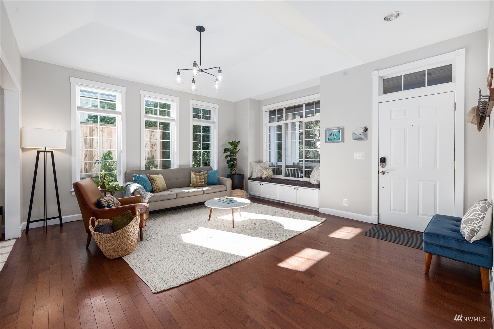 9419 Northeast 175th Street Bothell, WA 98011 - Photo 3 of 28 a living room with furniture and a large window